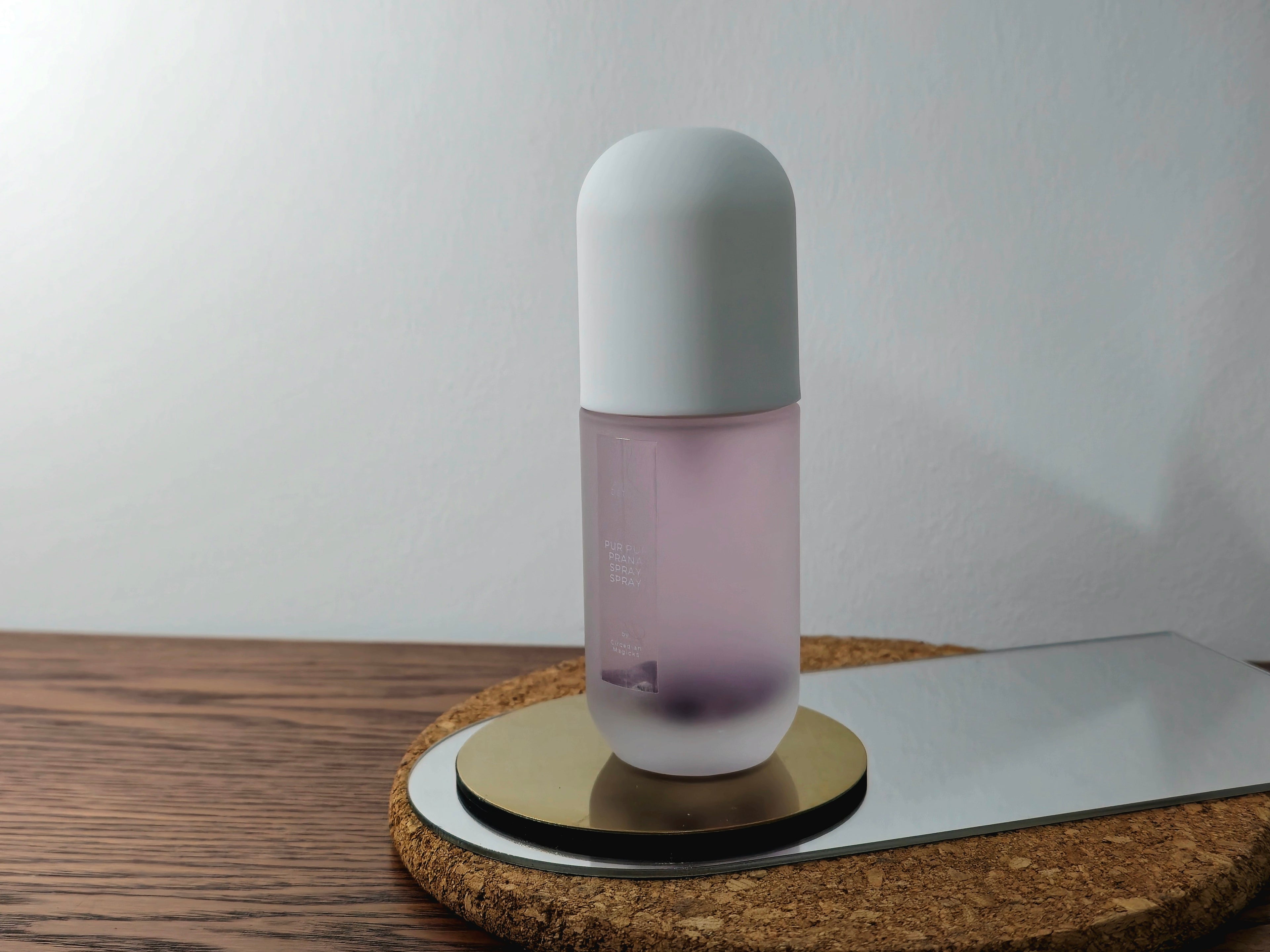 Aura Detox Mist (Lavender) from the Prana Mist Collection. Cleansing spray with charged crystal chips for energetic health and spiritual space clearing.