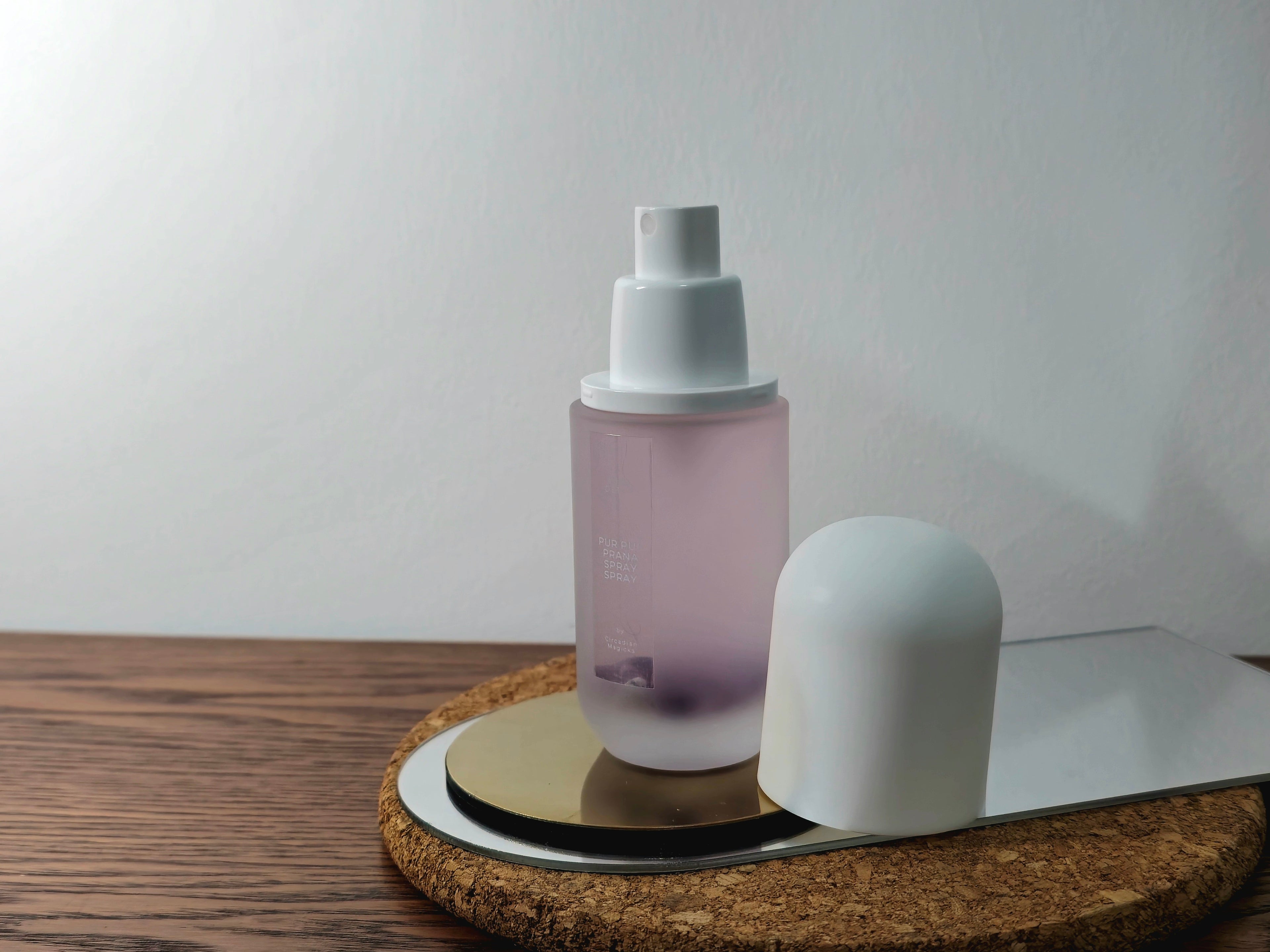 Aura Detox Mist (Lavender) from the Prana Mist Collection. Cleansing spray with charged crystal chips for energetic health and spiritual space clearing.